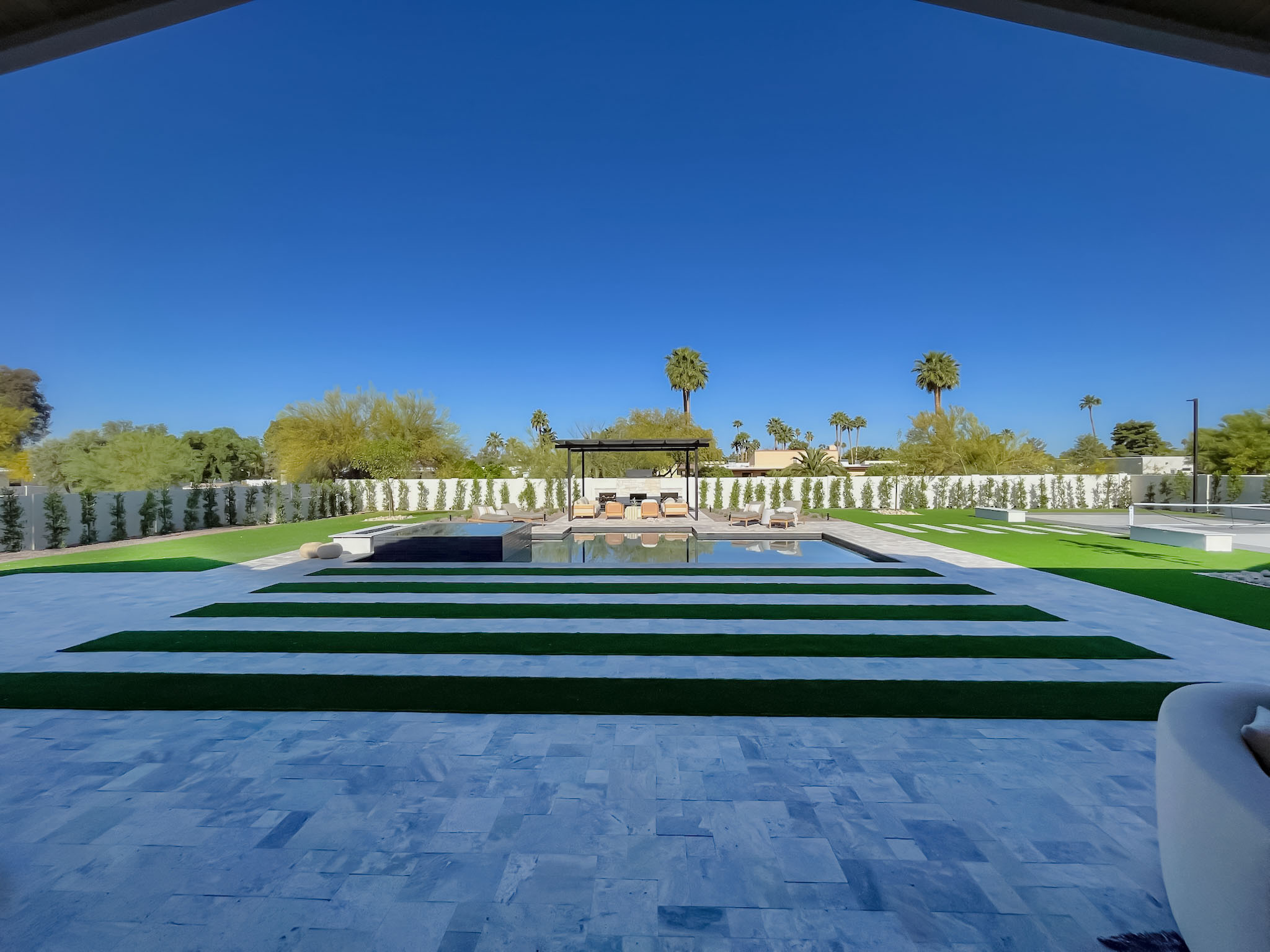 modern-backyard-oasis-with-turf-inlays-and-pool-scottsdale